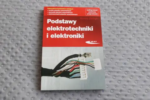 Podręcznik "Podstawy elektrotechniki i elektroniki" z ilustracją wiązki przewodów. Idealny dla przyszłych mechaników pojazdów samochodowych.