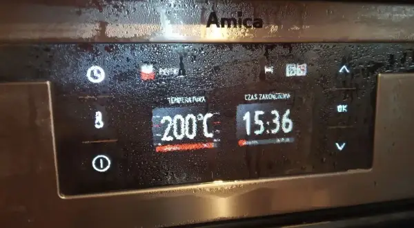Panel sterowania piekarnika Amica z ustawioną temperaturą 200°C i czasem zakończenia 15:36. Jak odblokować piekarnik Amica?